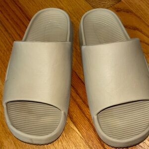 Nike tan  Calm Slide Sandals